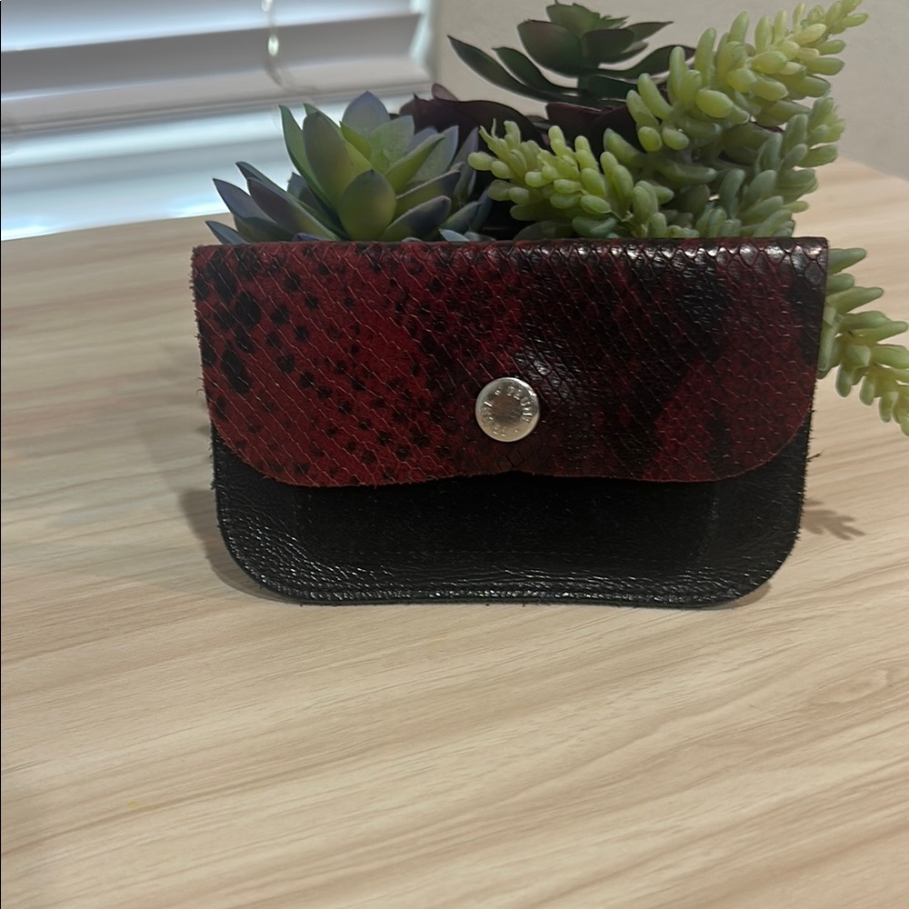 Elegant Red and Black Snakeskin Wallet.